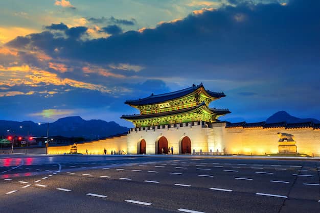 Gyeongbokgung Palace at sunset with light trails in Seoul, South Korea